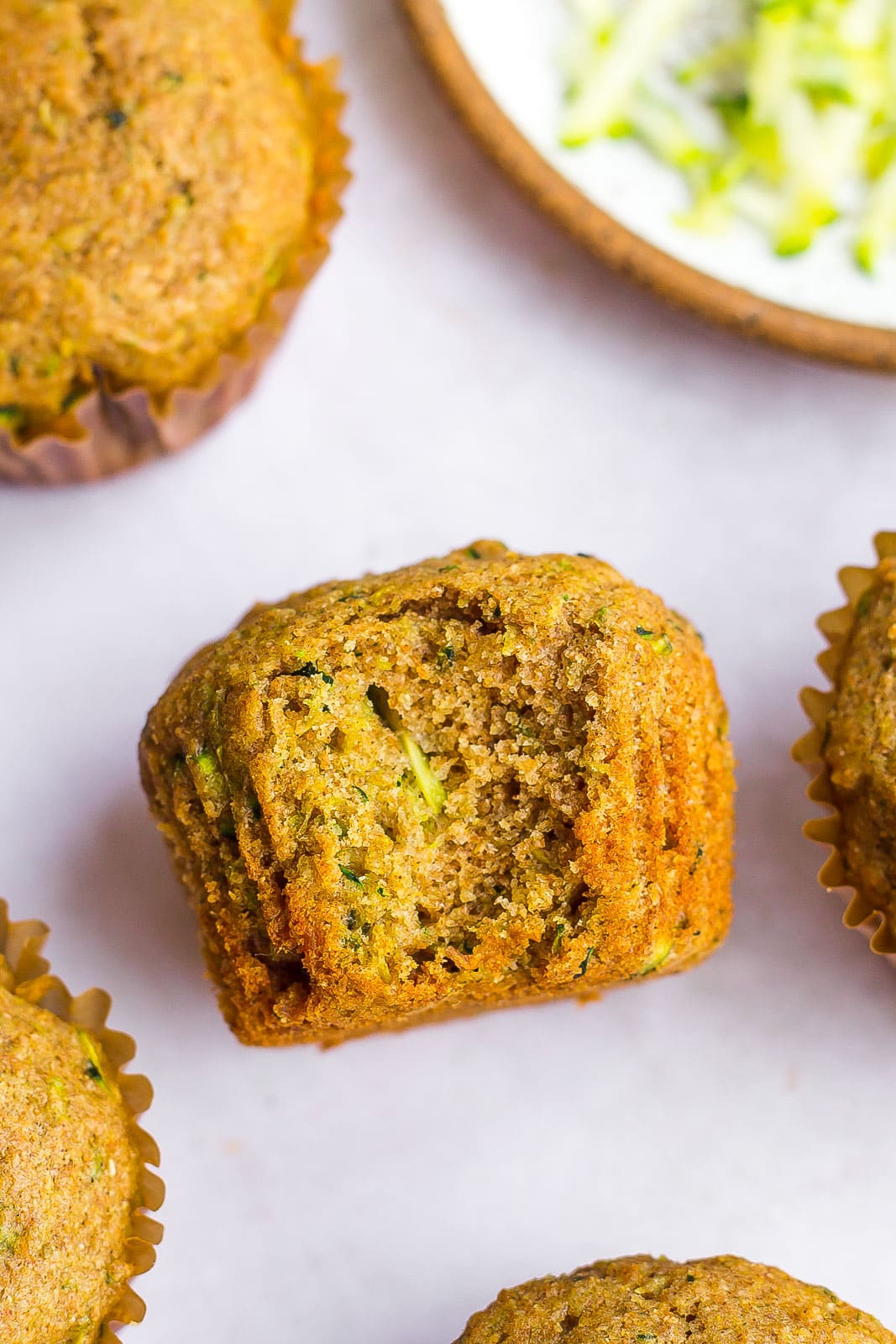 Healthy Zucchini Muffins with bite mark