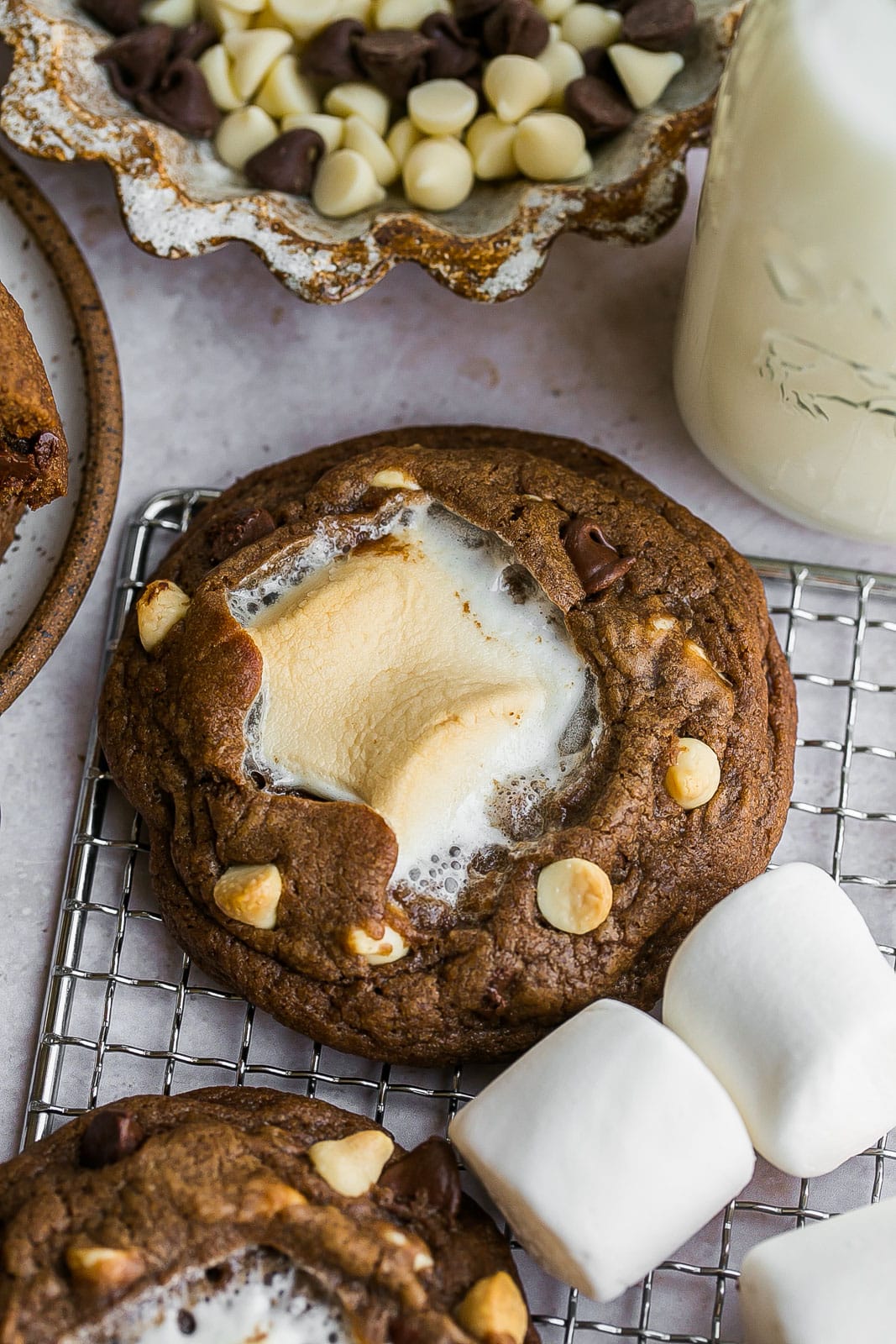 Chocolate cookie on cooling wrack with melted marshmallow. 