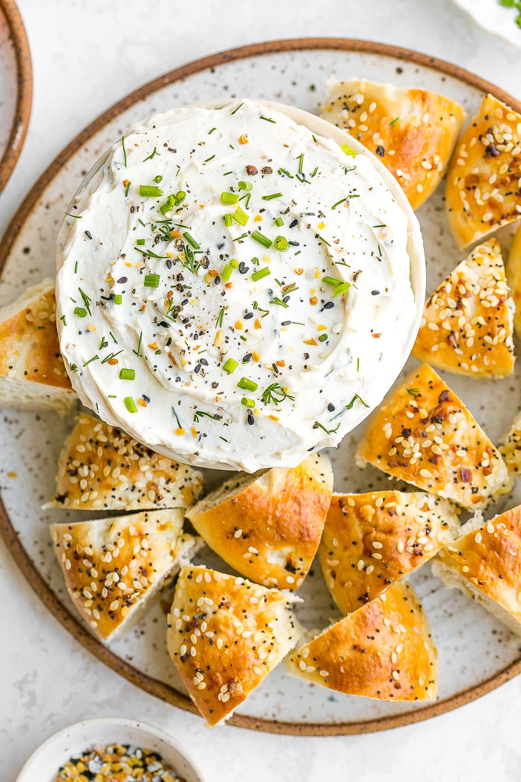 Birdseye view of dip with bagels.