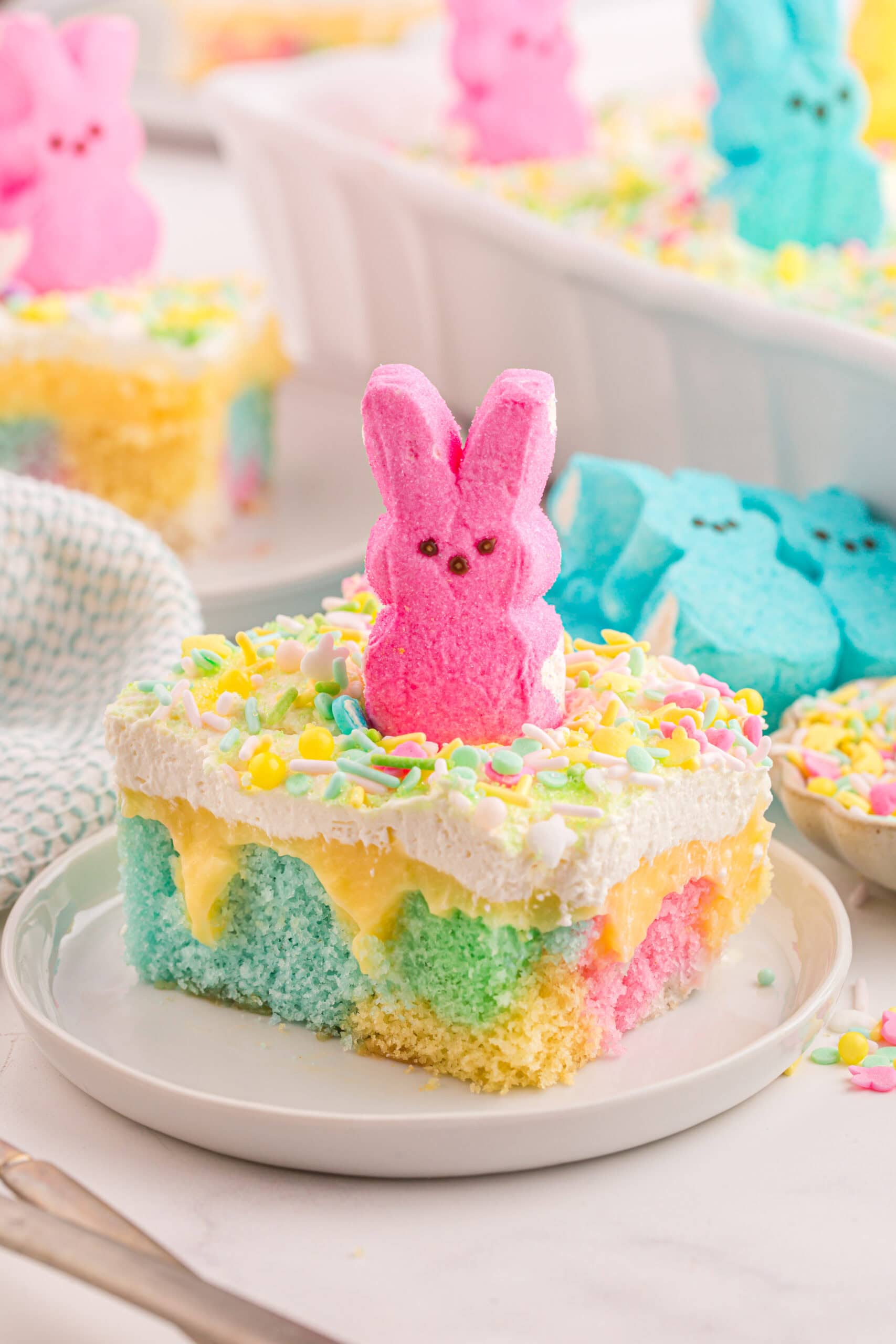 Slice of Easter Poke Cake.